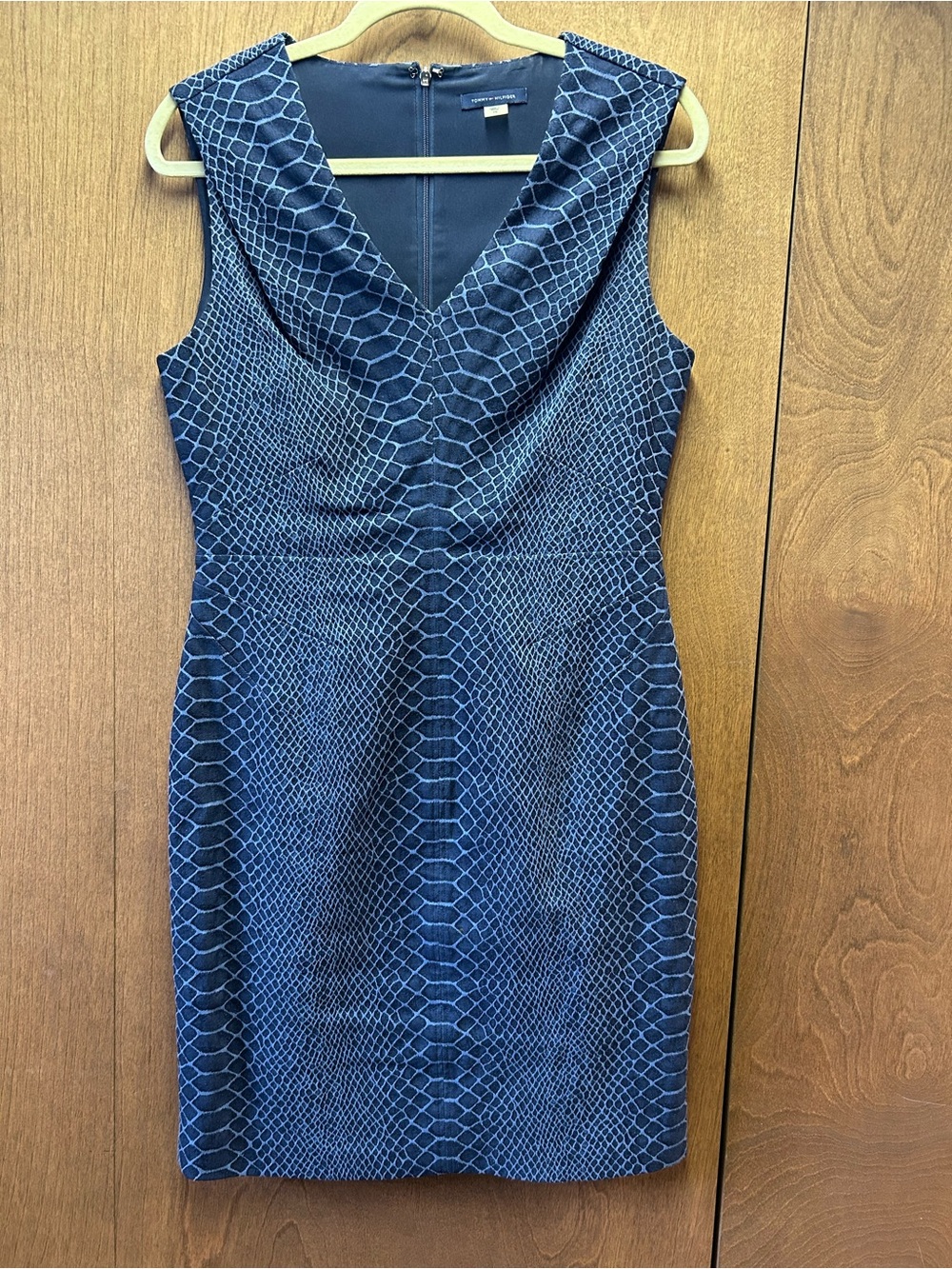 Sleeveless v-neck, above knee Jean dress.  Size 10, great fit/style.